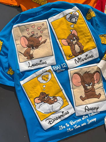 a blue t-shirt featuring Tom and Jerry cartoon graphics, likely from brands like The Souled Store or other retailers offering similar character merchandise (PACK OF 3)