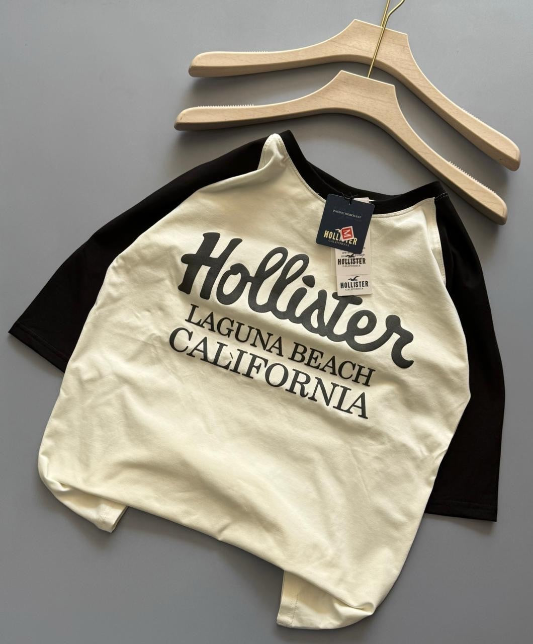 Hollister Co. colorblock logo graphic tees, featuring raglan sleeves and various California-inspired graphic (PACK OF 3)