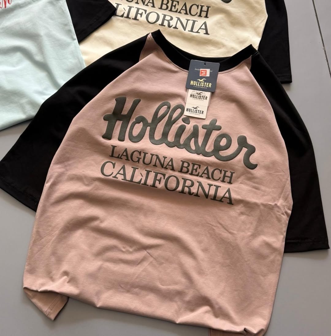 Hollister Co. colorblock logo graphic tees, featuring raglan sleeves and various California-inspired graphic (PACK OF 3)